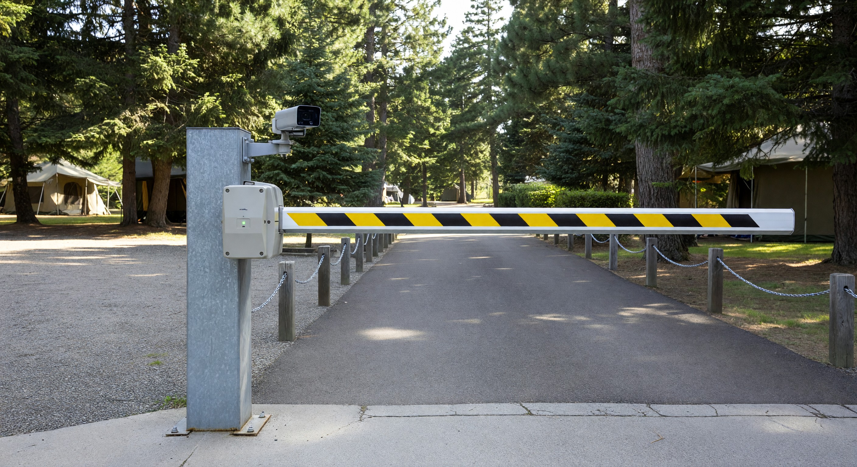 Campground gate with barrier arm, LPR camera, and RFID reader mounted in an entry lane
